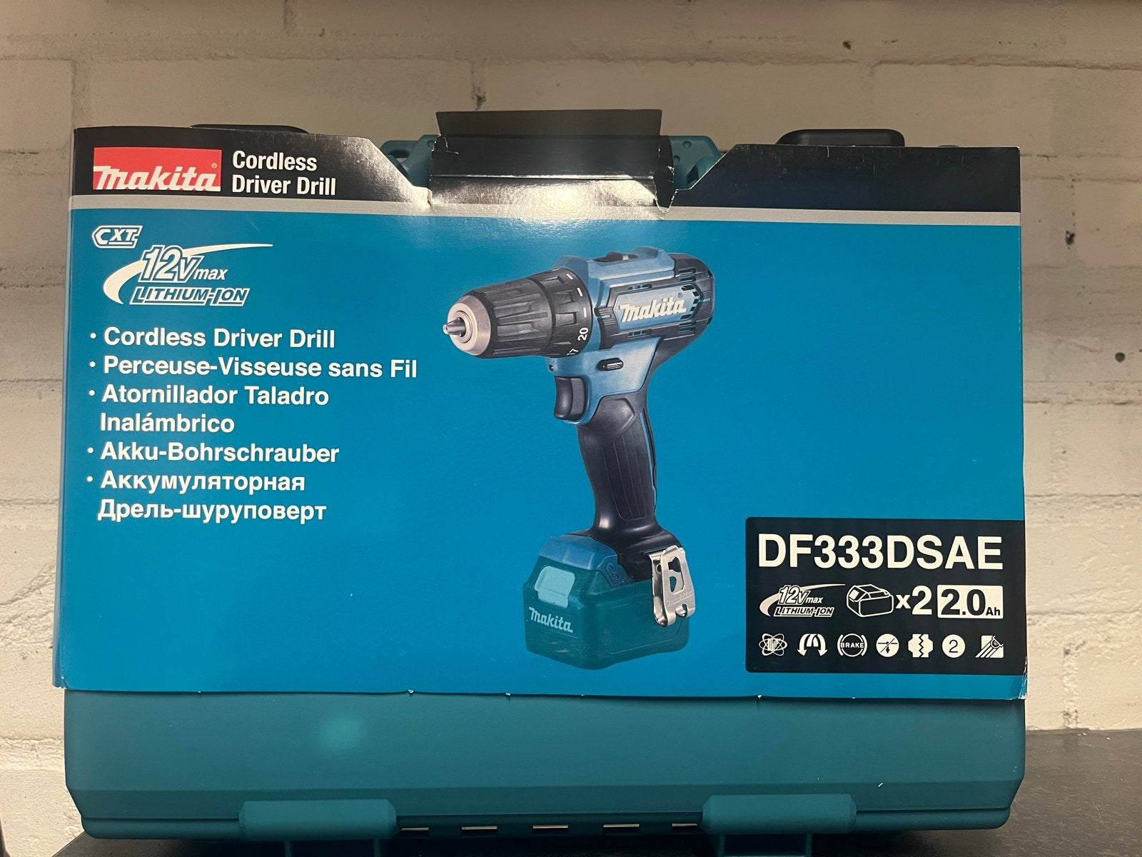 Makita Accuboormachine 12V met 2 accu's en lader, Variabele snelheid, Nieuw, Ophalen of Verzenden, Boor- en Schroefmachine