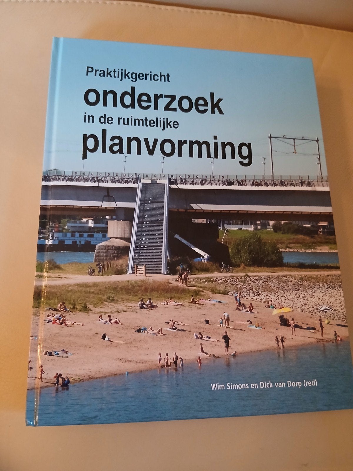 Praktijkgericht onderzoek in de ruimtelijke planvorming, Boeken, Zo goed als nieuw, Gamma, Wim Simons en Dick van Dorp (red), HBO