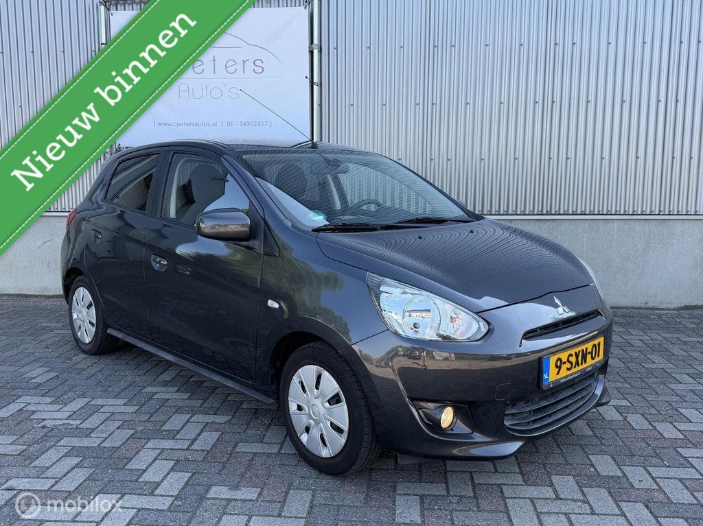 Mitsubishi Space Star 1.2 80pk Invite 2014 5deurs / Airco /, Auto's, Mitsubishi, Euro 5, Stof, Gebruikt, 200 kg
