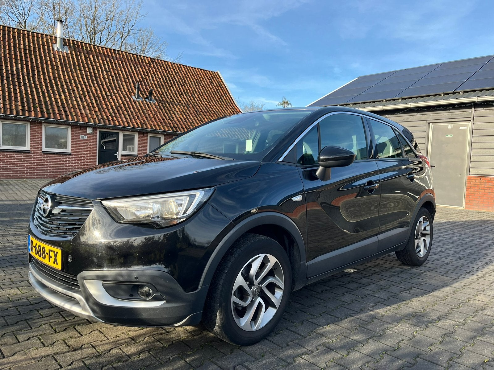 Opel Crossland X 1.2 Innovation | NAP 71.576 km, Voorwielaandrijving, 83 pk, 1063 kg, Zwart