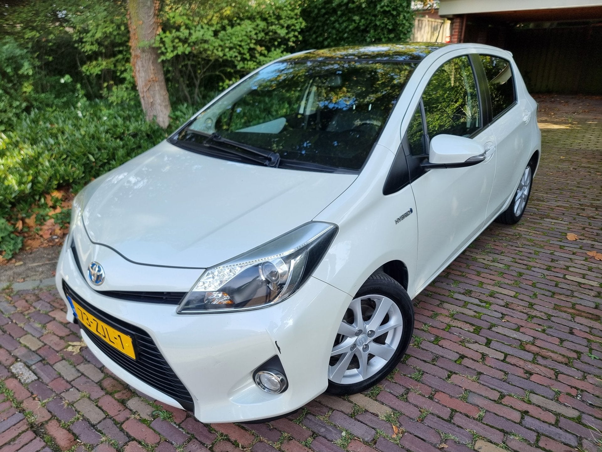 Toyota Yaris 1.5 Full Hybrid Dynamic Pano/Navi/Half leder, Auto's, Toyota, Euro 5, 1497 cc, Gebruikt, 4 cilinders