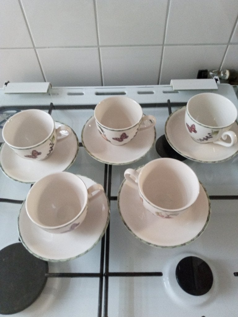 kop en schotels Janneke Brinkman, Huis en Inrichting, Keuken | Servies, Gebruikt, Ophalen of Verzenden, Overige stijlen, Kop(pen) en/of Schotel(s)