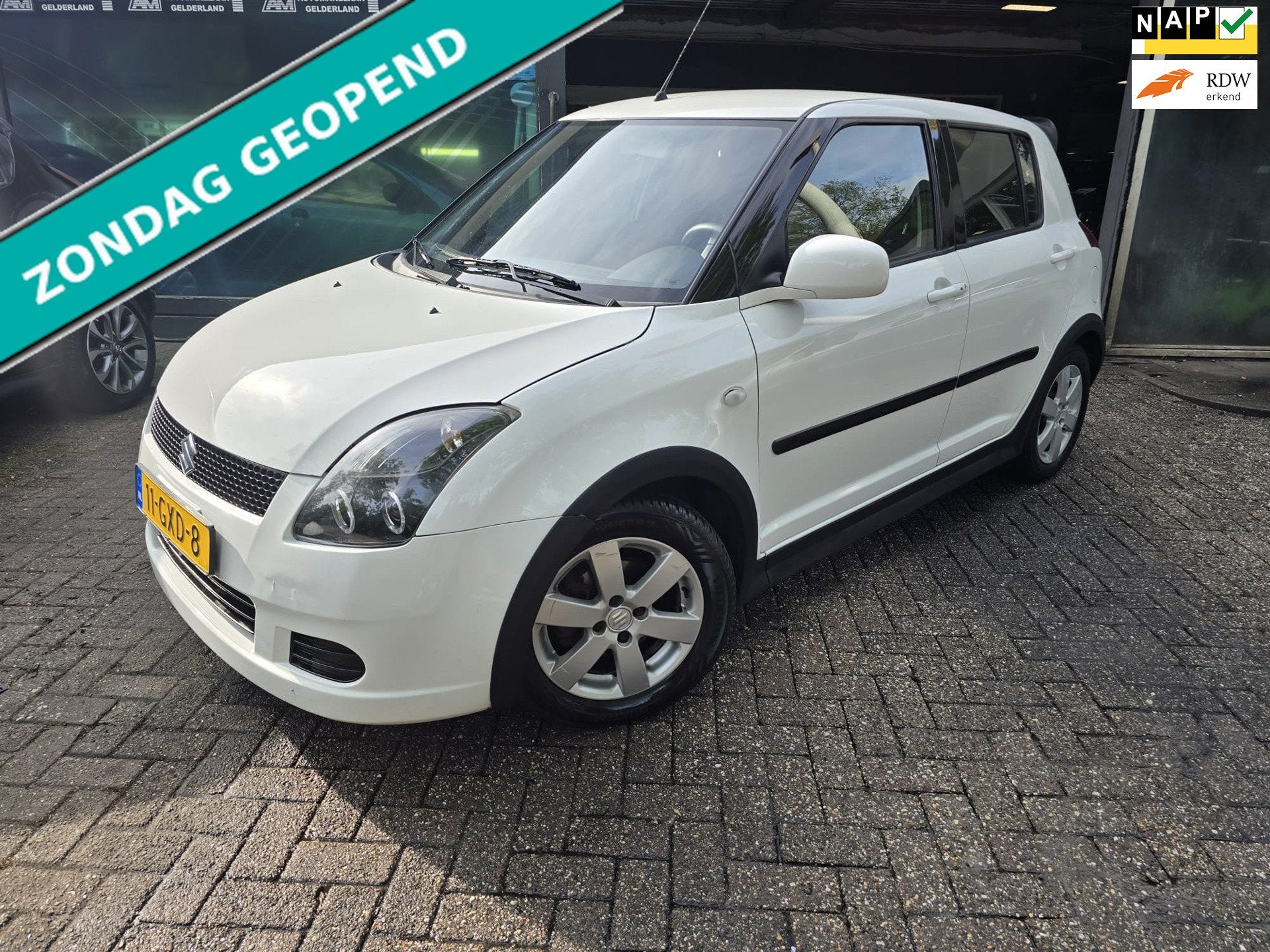 Suzuki Swift 1.5 Exclusive | NIEUWE APK | NW KOPPELING | AIR, Stof, 4 cilinders, 400 kg, Bedrijf