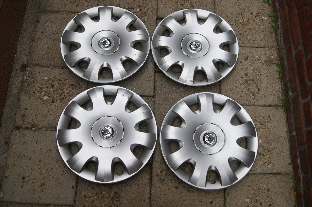 Set van 4 originele wieldoppen Skoda Octavia 15 inch, Ophalen of Verzenden, Gebruikt