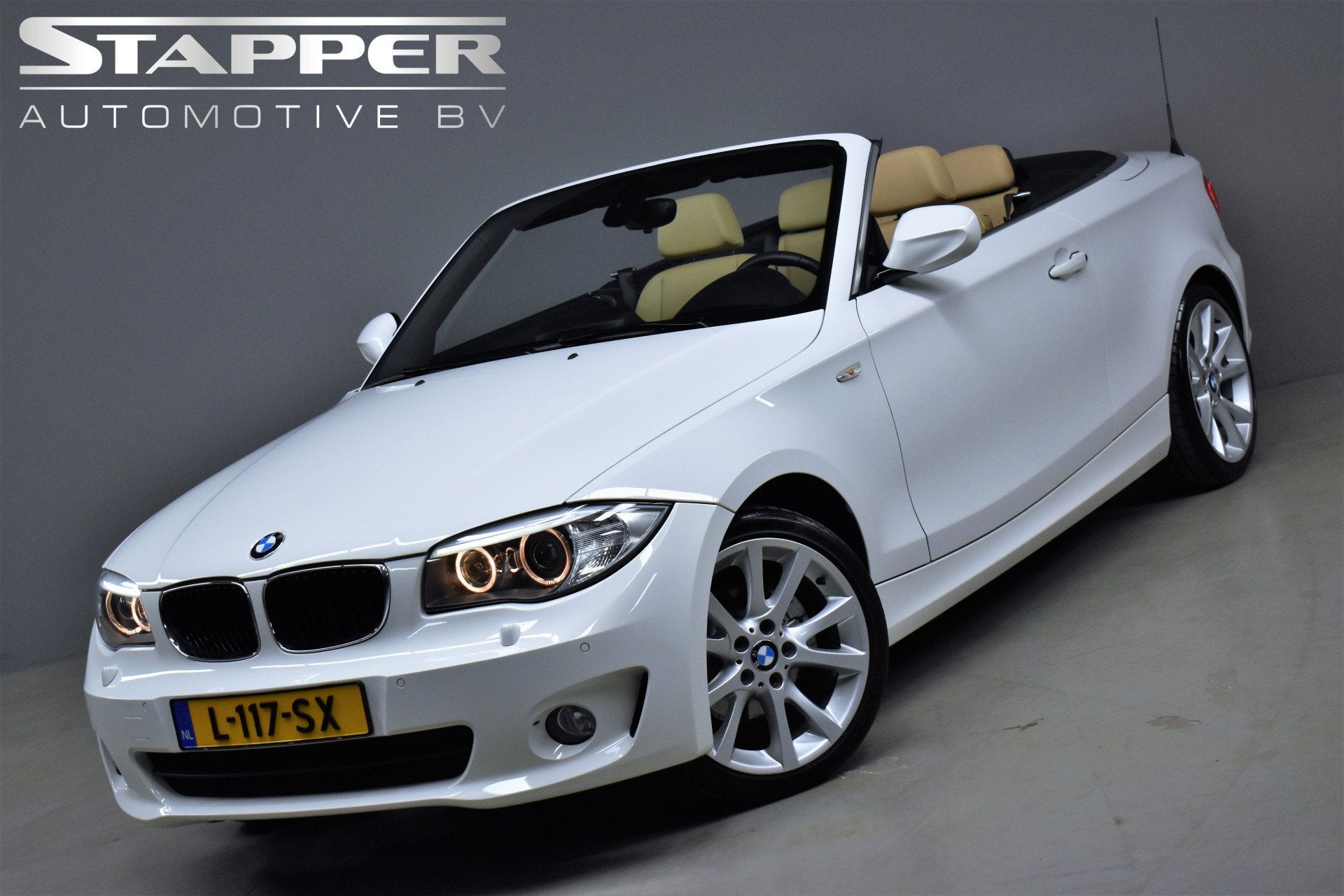 BMW 1 Serie Cabrio 125i 218pk 6-Cil Automaat High Executive, Auto's, BMW, Euro 5, Achterwielaandrijving, Beige, 4 stoelen
