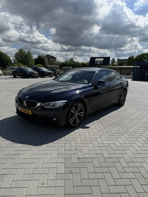 BMW 4-Serie 420i Gran Coupe High Executive M-Line, Auto's, BMW, Achterwielaandrijving, Zwart, Zwart, Particulier