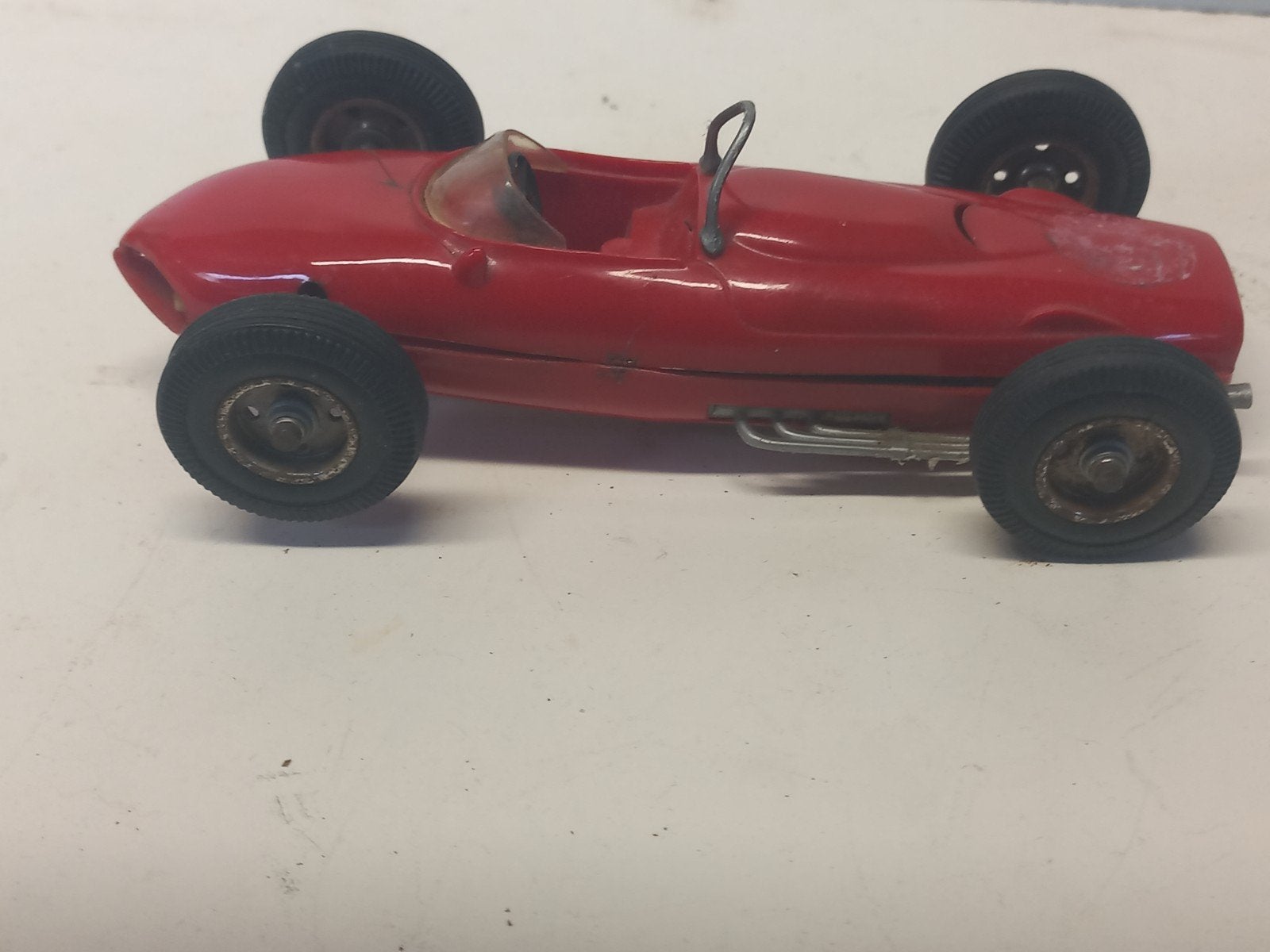 Ferrari raceauto met scheurtje en vastzittende motor, Ophalen of Verzenden, Gebruikt