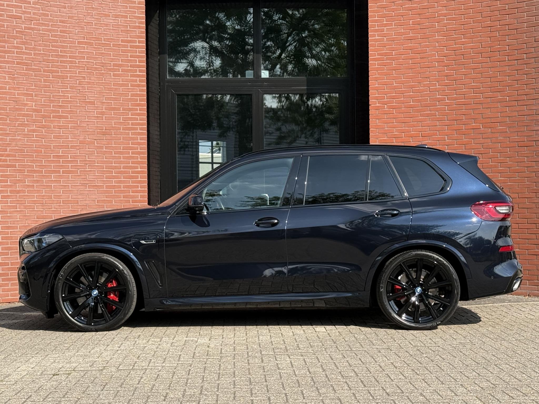 BMW X5 xDrive45e M-Sport 4-Wielsturing B&W CoPilot Sky, Auto's, Automaat, Gebruikt, 394 pk, Zwart