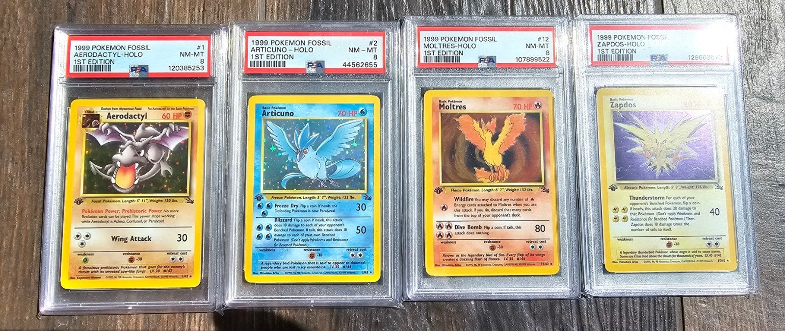Set 1st Edition Legendary Birds PSA 8 🪶❄️🔥⚡️, Ophalen of Verzenden, Nieuw, Meerdere kaarten, Foil