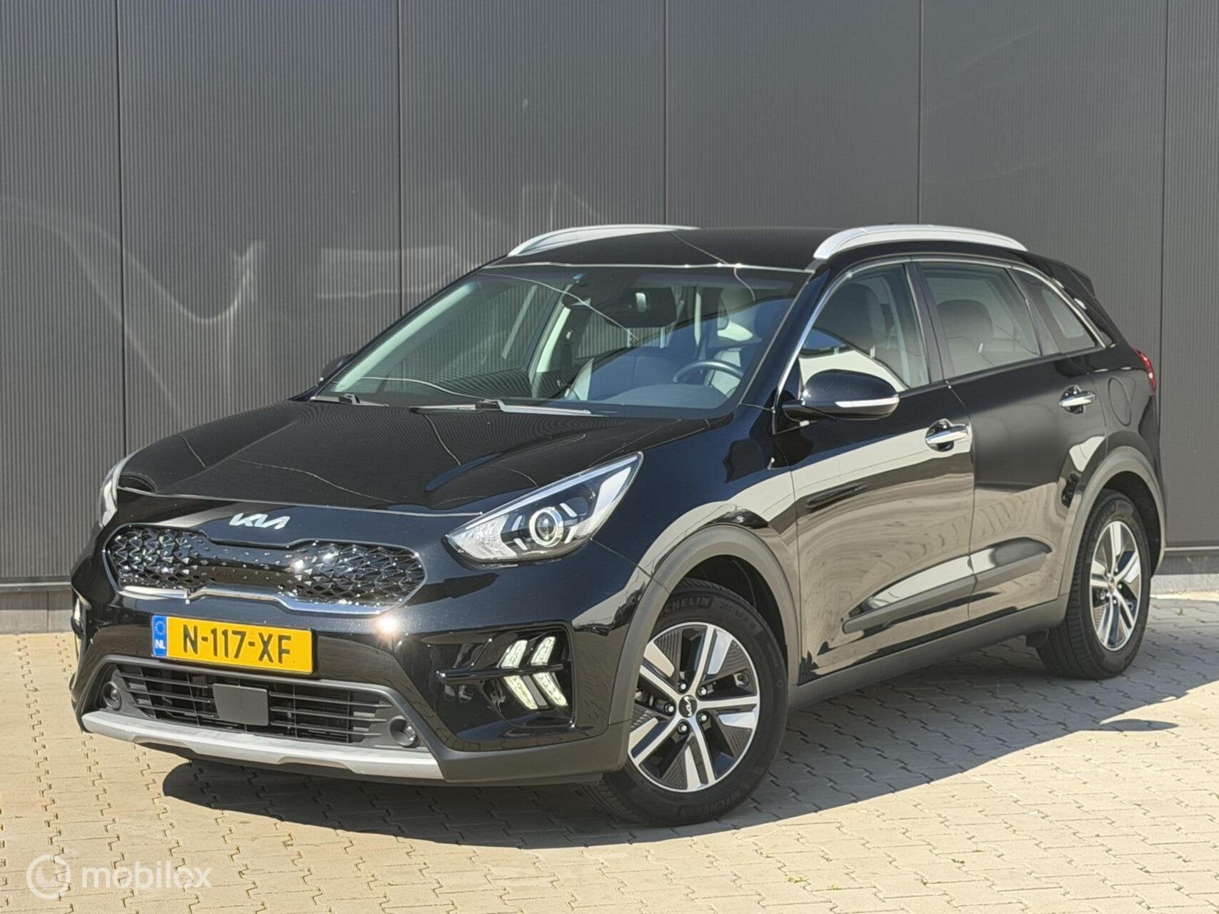Kia Niro 1.6 GDi Hybrid DynamicLine | CRUISE | TREKHAAK |, Auto's, Gebruikt, Automatische klimaatregeling, Leder en Stof, Zwart