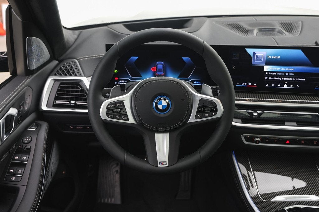 BMW X5 xDrive50e M Sport Automaat / Panoramadak Sky Lounge /, Auto's, Automaat, 2395 kg, Zwart, Leder