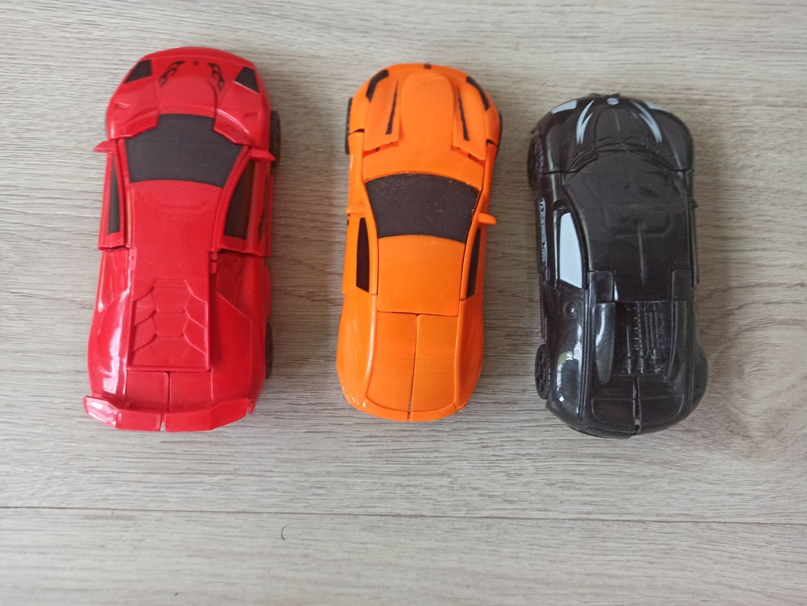 Set van 3 Transformer Auto's - Rood, Oranje, Zwart, Kinderen en Baby's, Speelgoed | Speelgoedvoertuigen, Ophalen of Verzenden