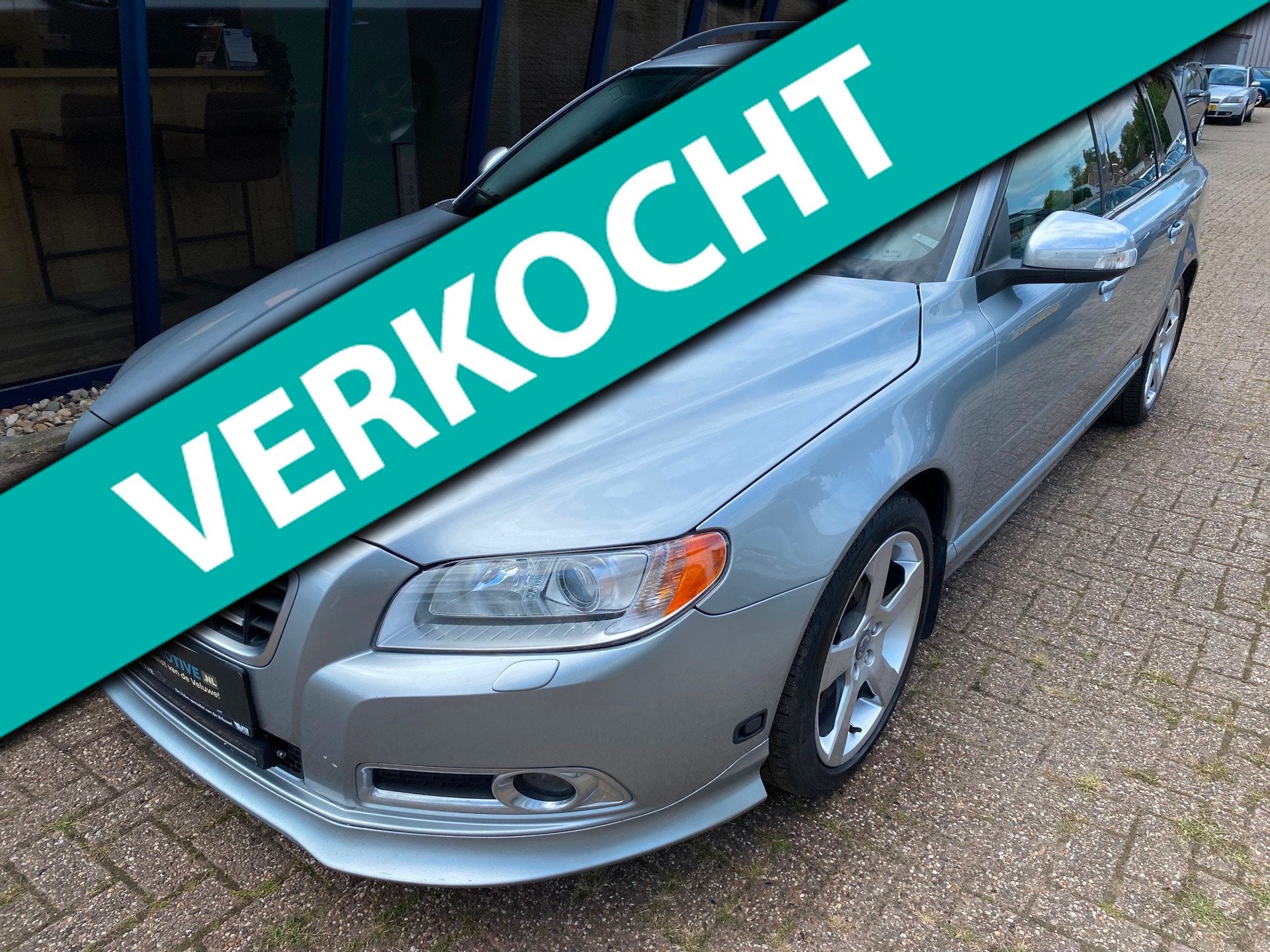 Volvo V70 2.5FT R-Design 230PK LEER / XENON / TREKHAAK / PDC, Auto's, Volvo, Gebruikt, Zwart, 2521 cc, Handgeschakeld