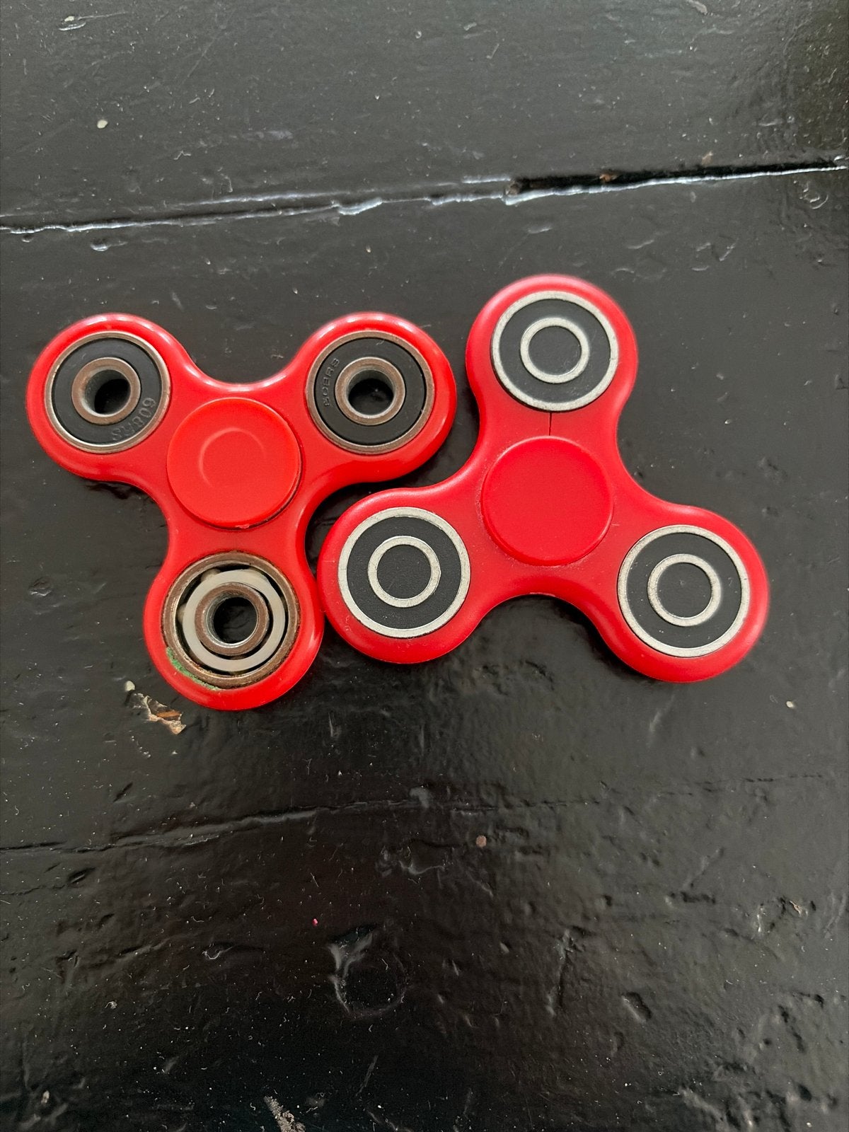 2 Rode Fidget Spinners, Ophalen of Verzenden, Gebruikt, Jongen of Meisje