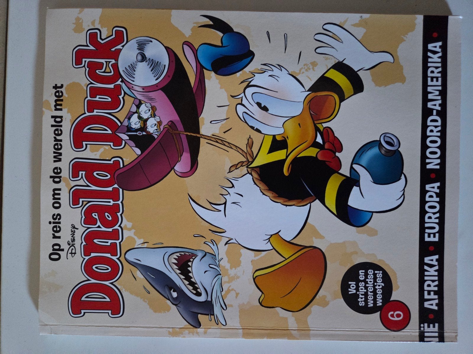 Donald Duck Op reis om de wereld met Donald Duck, Eén stripboek, Ophalen, Gelezen, Walt Disney