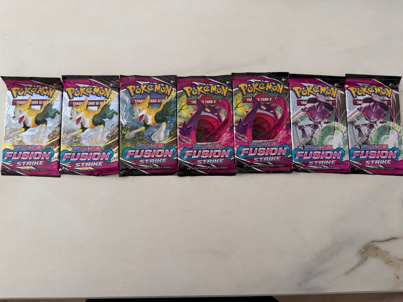 7 Pokémon Fusion Strike Booster Packs -, Ophalen of Verzenden, Nieuw, Booster