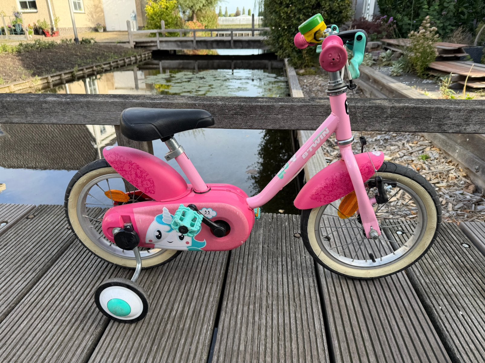 Roze eenhoorn B’Twin met afhaalbare zijwieltjes, Fietsen en Brommers, Ophalen, Zijwieltjes, Velgrem, Minder dan 16 inch