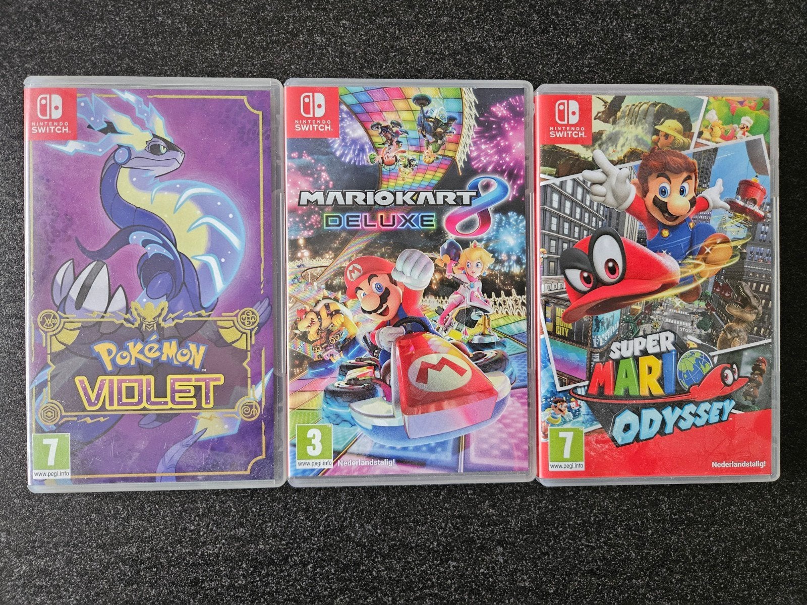 Foto 10 van Nintendo Switch OLED Wit + 3 Games & Accessoires