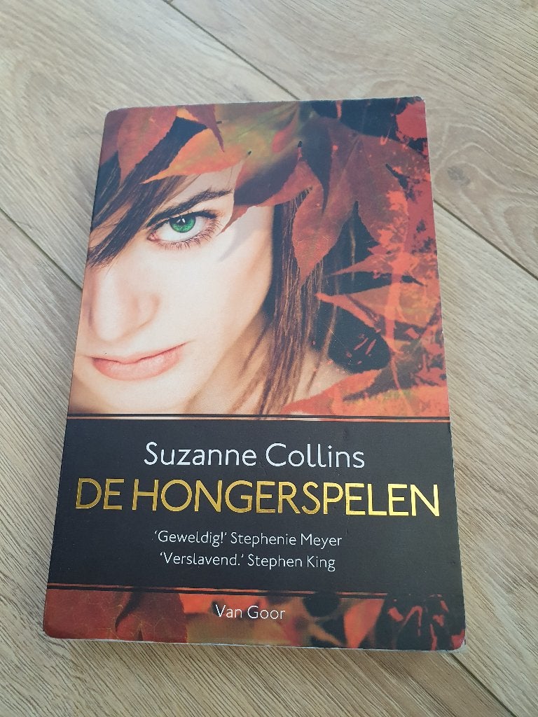Suzanne Collins– De Hongerspelen | The Hunger Games | Deel 1, Boeken, Ophalen of Verzenden, Zo goed als nieuw, Suzanne Collins