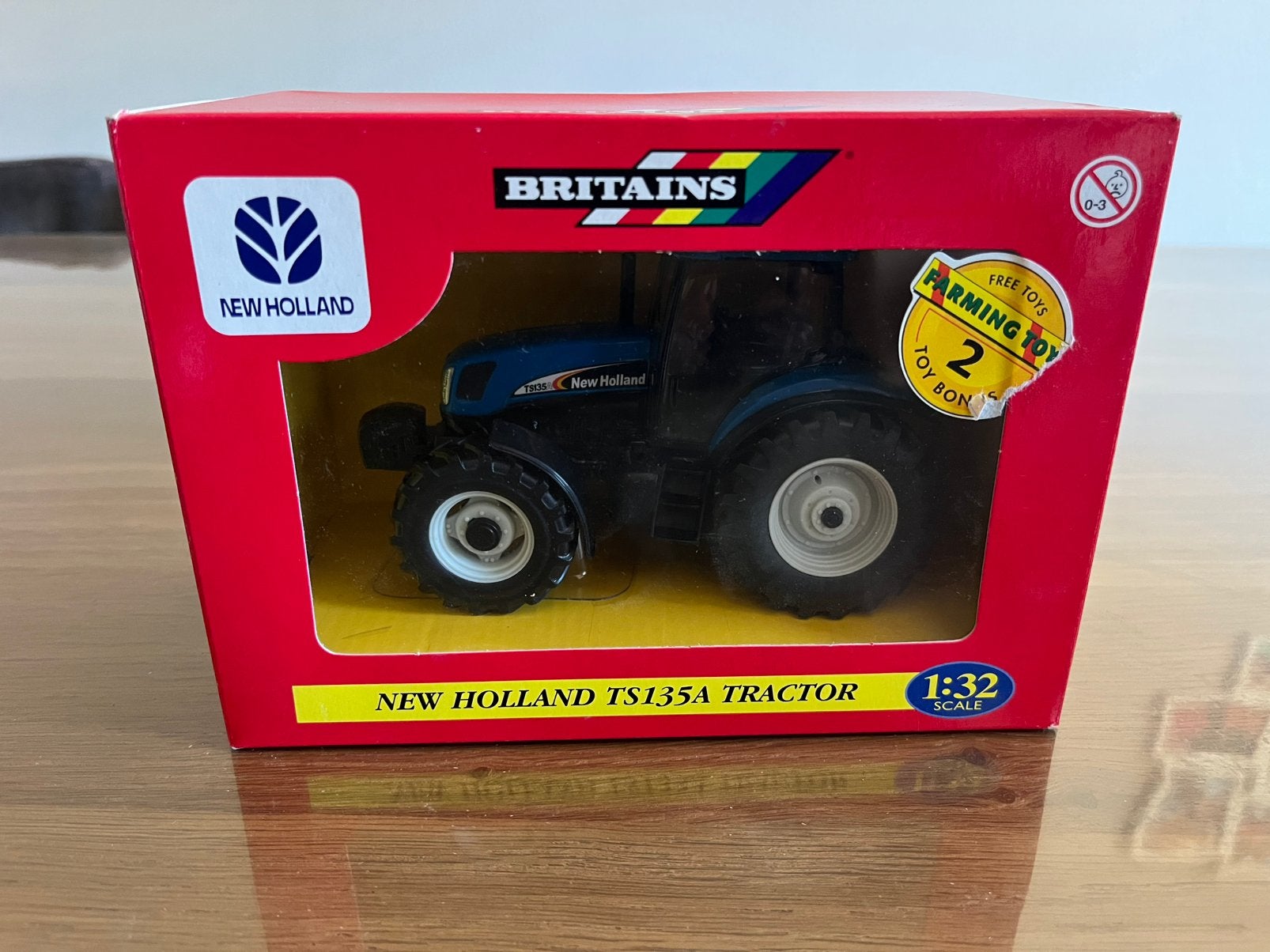 New Holland TS135A tractor Britains 40848, Hobby en Vrije tijd, Modelauto's | 1:32, Ophalen of Verzenden, Nieuw, Tractor of Landbouw