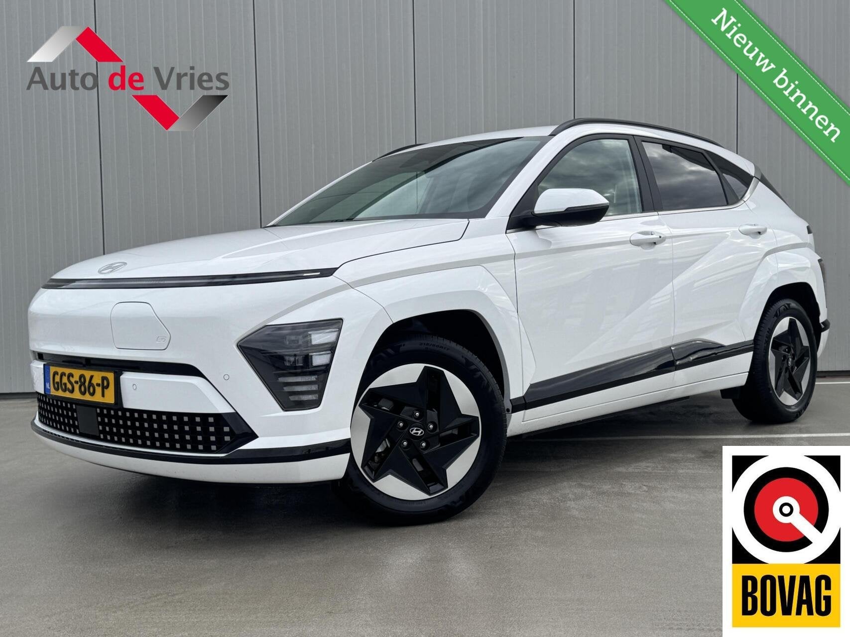 Hyundai Kona Electric Comfort Smart 65 kWh|NL-Auto|Trekhaak, Auto's, Gebruikt, Met garantie (alle), Wit, 300 kg