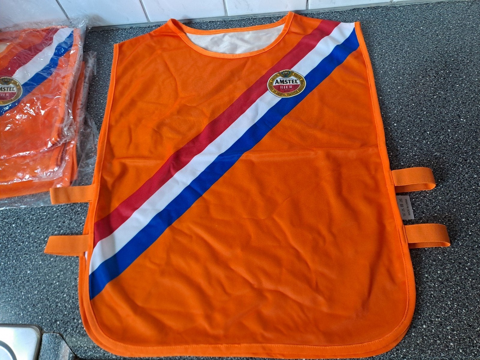 Amstel Bier Oranje Hesje - Nieuw, Verzamelen, Biermerken, Ophalen of Verzenden, Nieuw, Overige typen, Amstel