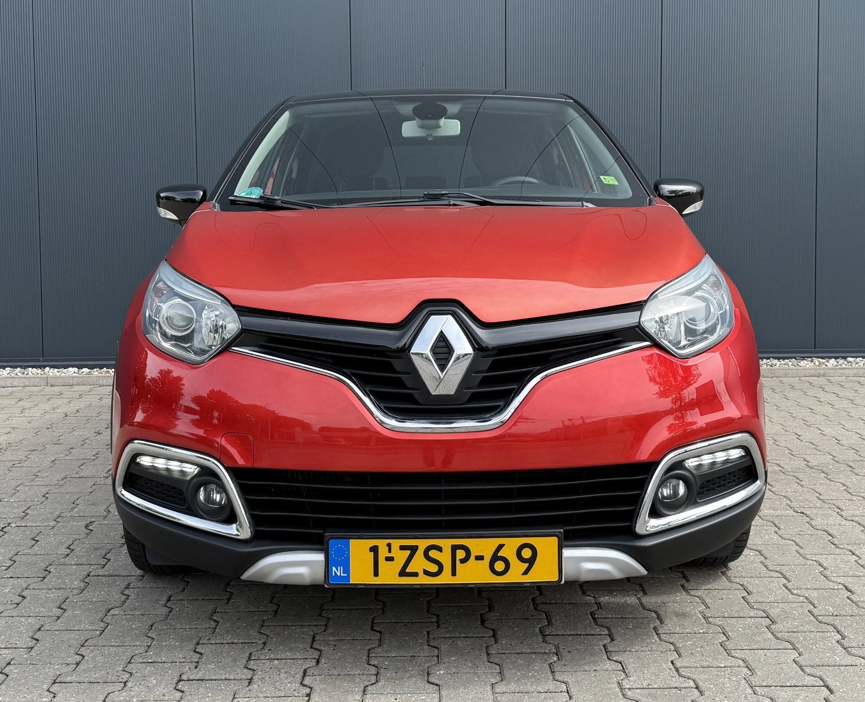 Renault Captur 1.2 TCe Helly Hansen Airco Cruise Automaat Ca, Auto's, Euro 5, Zwart, 4 cilinders, Leder en Stof