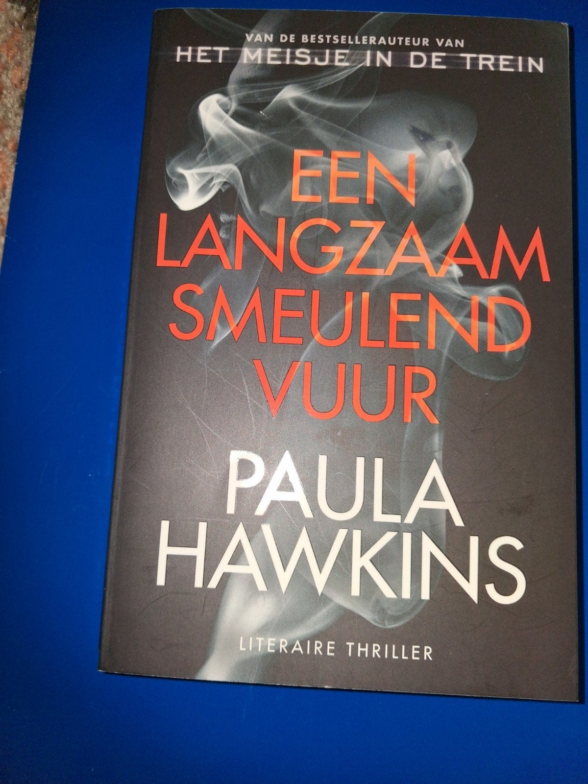 Paula Hawkins - Een langzaam smeulend vuur, Ophalen of Verzenden, Zo goed als nieuw, Paula Hawkins