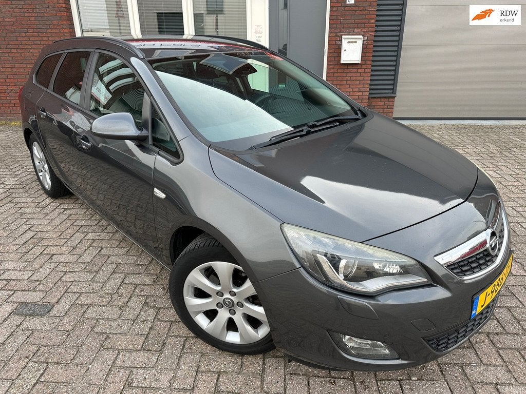 Opel Astra Sports Tourer 1.6 Turbo Cosmo / Airco / PDC / Cru, Voorwielaandrijving, Euro 5, Gebruikt, 4 cilinders