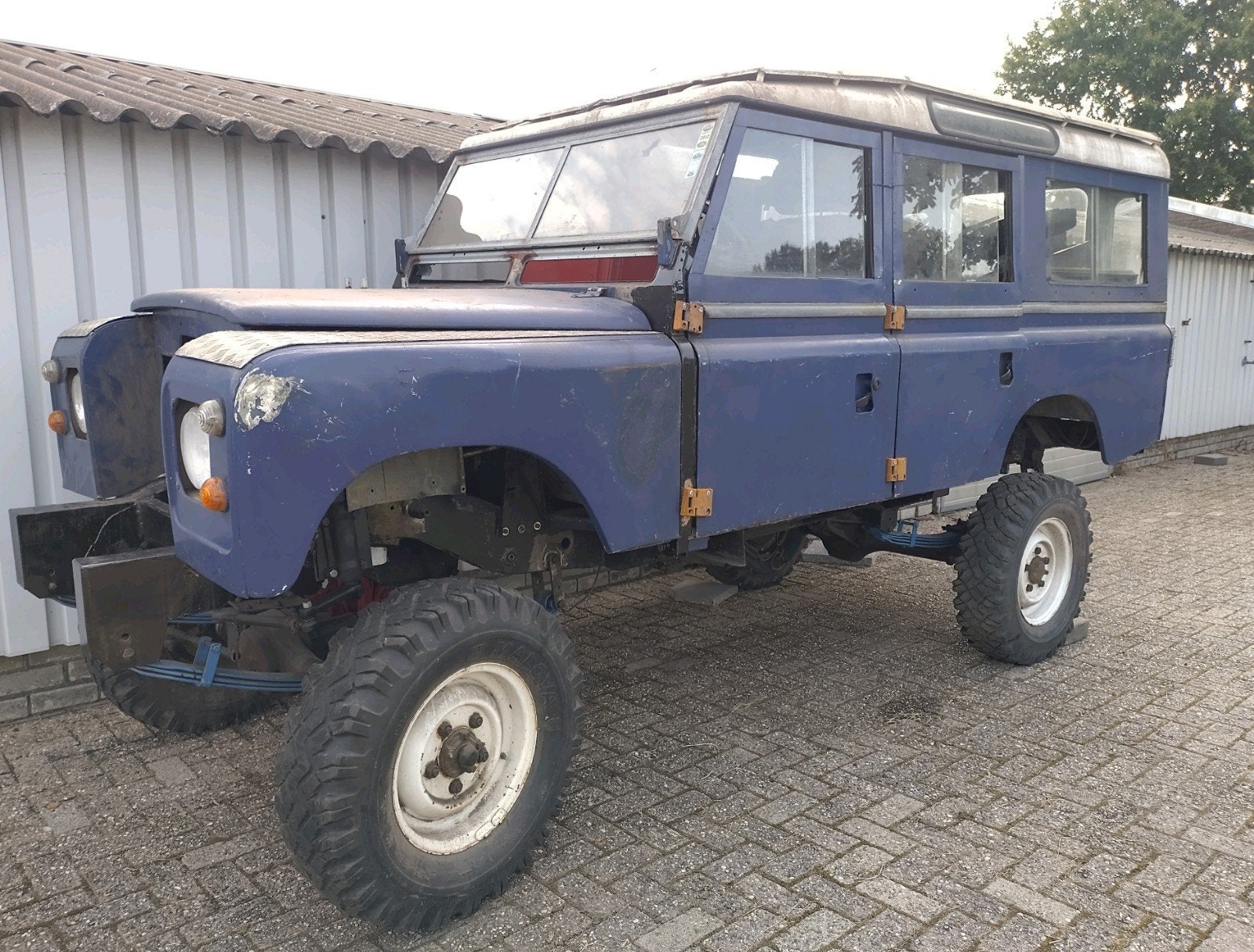 1977 Land Rover 109 Series 3 Stationwagon Diesel, Auto's, Trekhaak, Zwart, Blauw, Origineel Nederlands