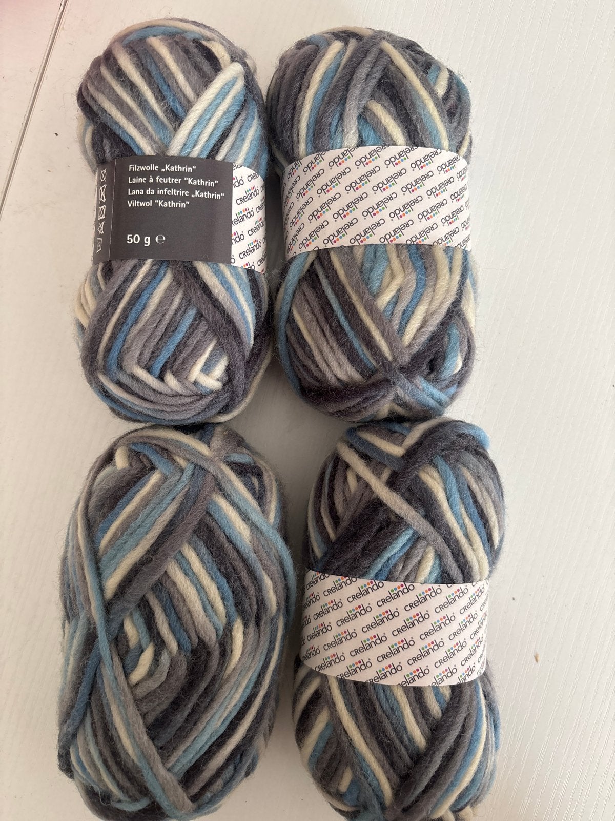 4 bollen Filzwolle "Kathrin" - Grijs/Blauw/Wit, Ophalen of Verzenden, Nieuw, Breien of Haken, Wol of Garen