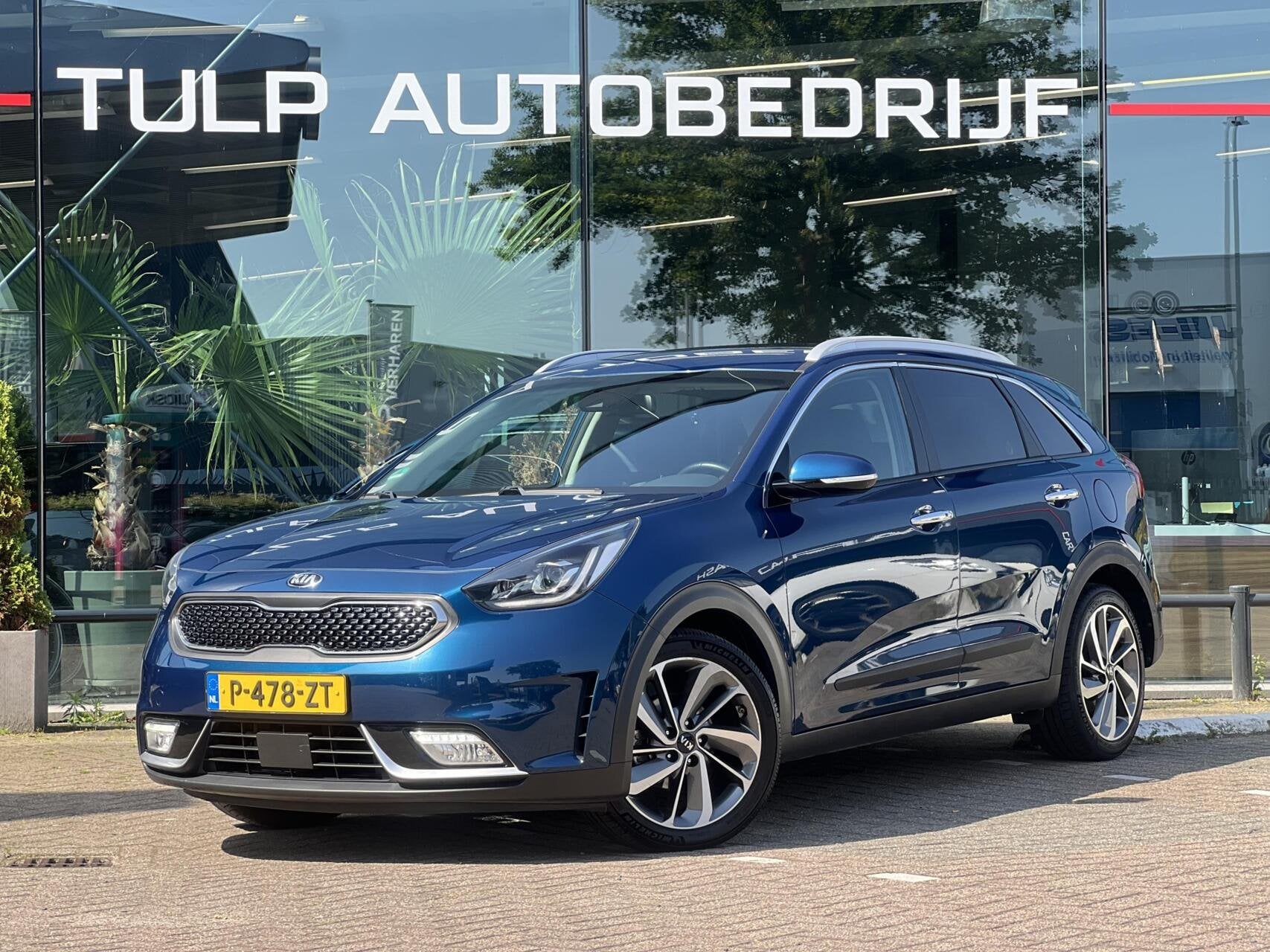 Kia Niro 1.6 GDi Hybrid ExecutiveLine Clima Leder Cruise JBL, Auto's, Dealer onderhouden, Blauw, 23 km/l, Leder