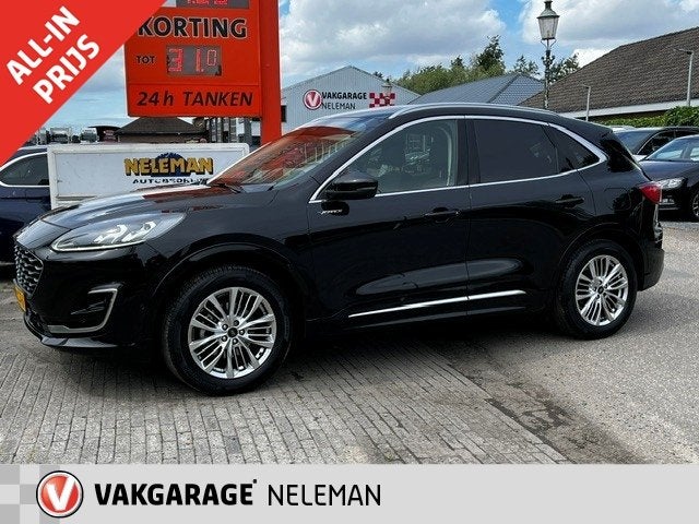 Ford Kuga 1.5 EcoBoost 150PK 2WD Vignale rijklaarprijs bovag, Voorwielaandrijving, 12 maanden, 15 km/l, Zwart