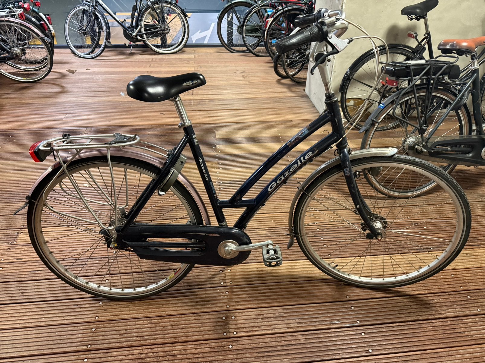 Gazelle donkerblauwe damesfiets (zsm ophalen), Ophalen, Gebruikt, Gazelle, Versnellingen