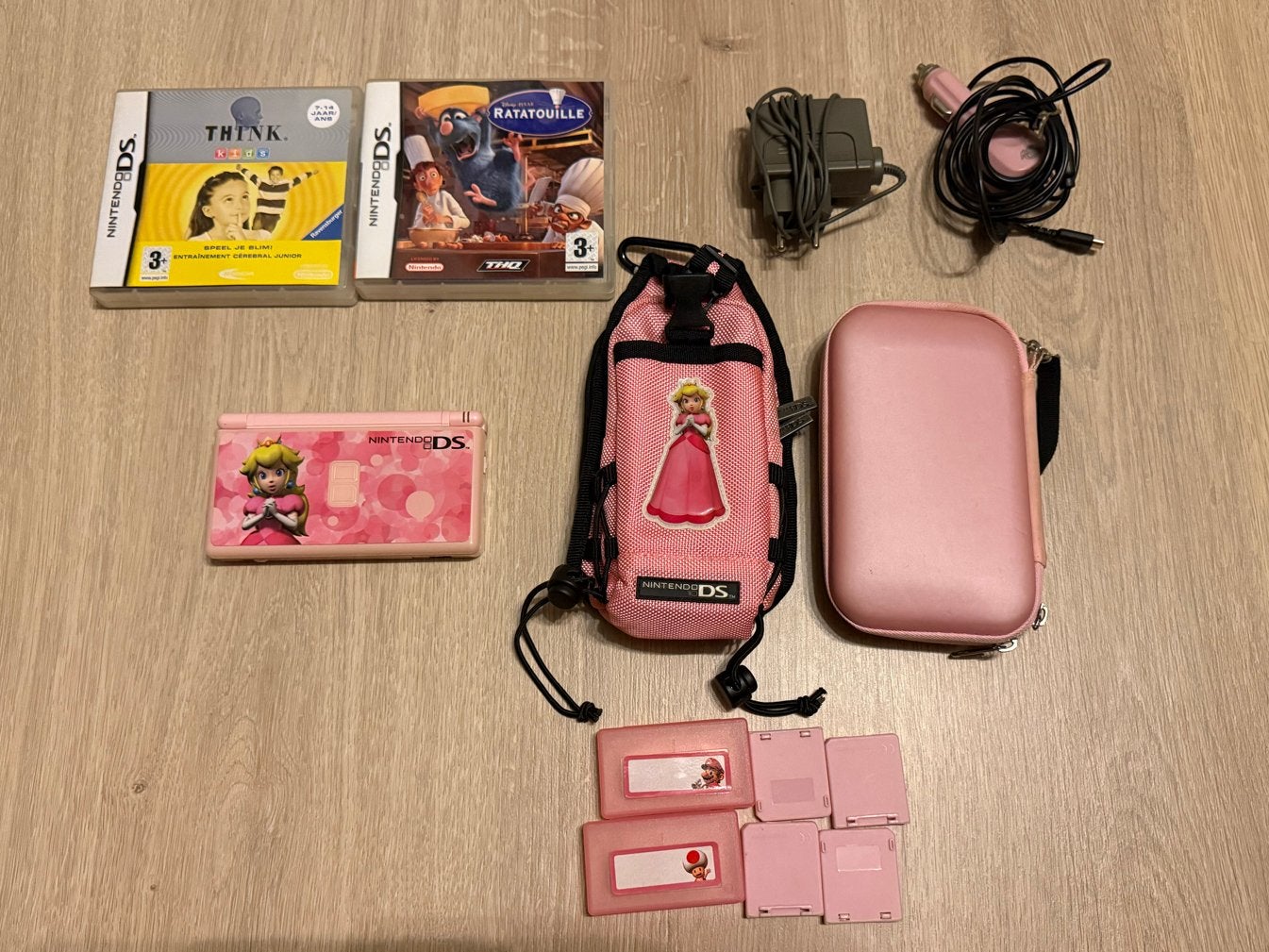 Nintendo DS Lite Peach Editie met accessoires, Ophalen of Verzenden, Zo goed als nieuw, Roze, Met beschermhoes of tas