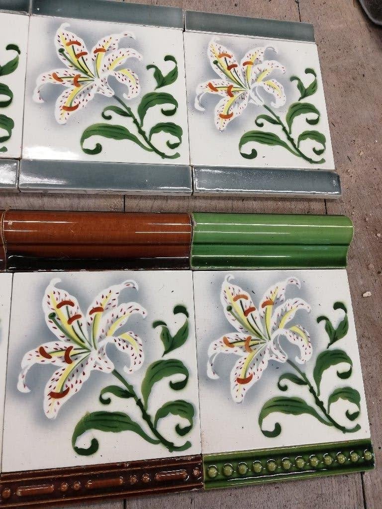 76 art nouveau wandtegels decor lelie, ook div. randen, Ophalen