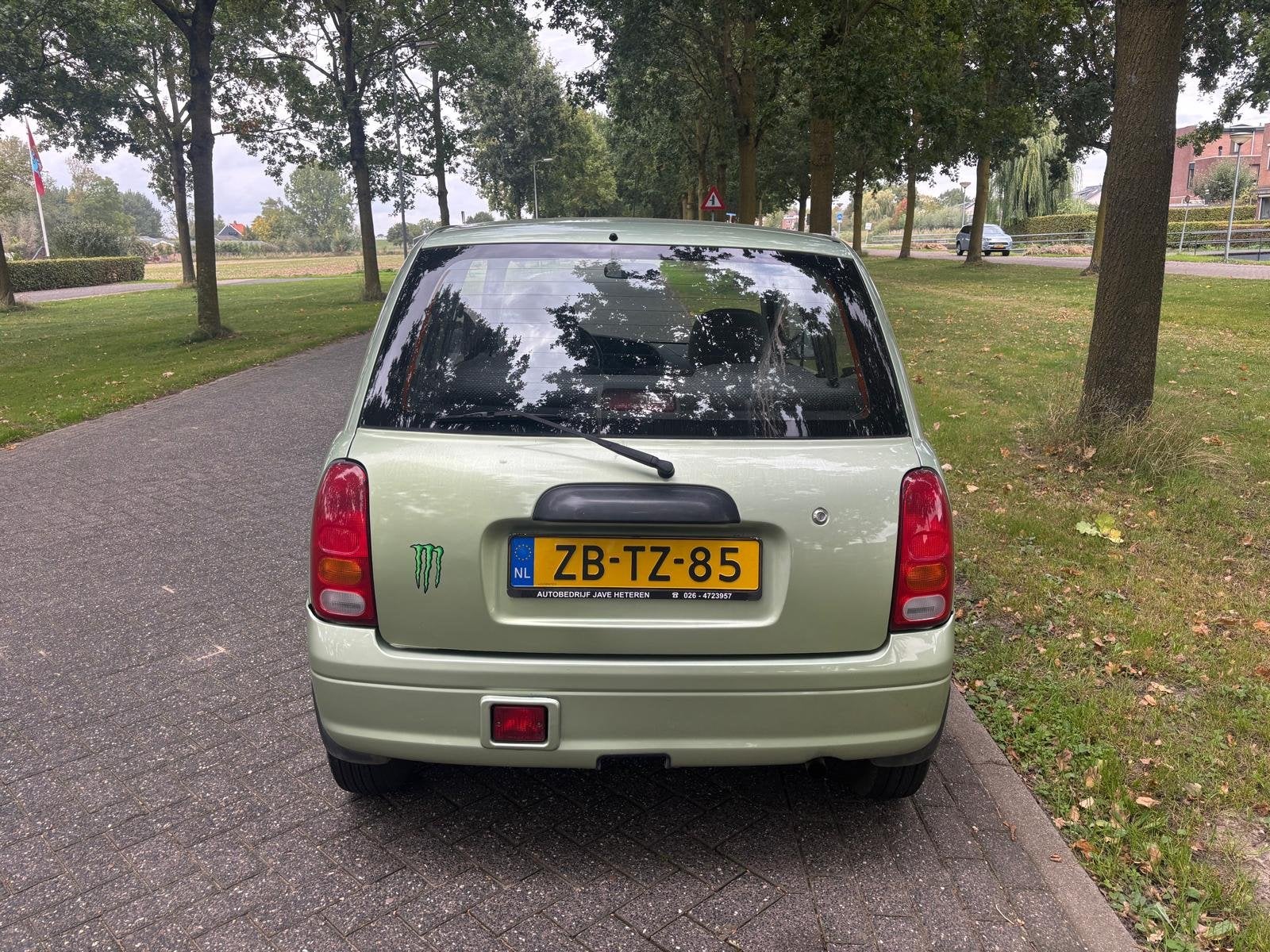 Daihatsu Cuore 1.0-12V XTi (bj 1999), foto 5