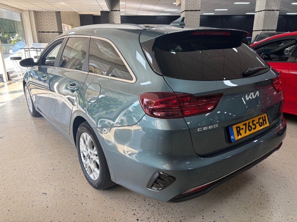 Kia CEED SW 1.0T-GDi MHEV Autom Half Leder Stoel Stuur verw., Auto's, Gebruikt, 1309 kg, Met garantie (alle), Hybride Elektrisch/Benzine
