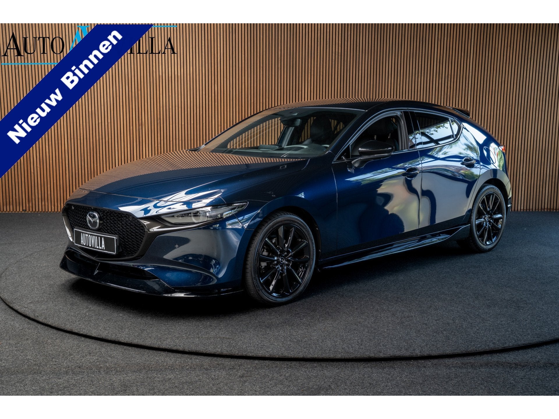 Mazda 3 2.0 e-SkyActivX M Hybrid 186 HUD Navi MRCC 360° PDC, Gebruikt, Zwart, 4 cilinders, Blauw