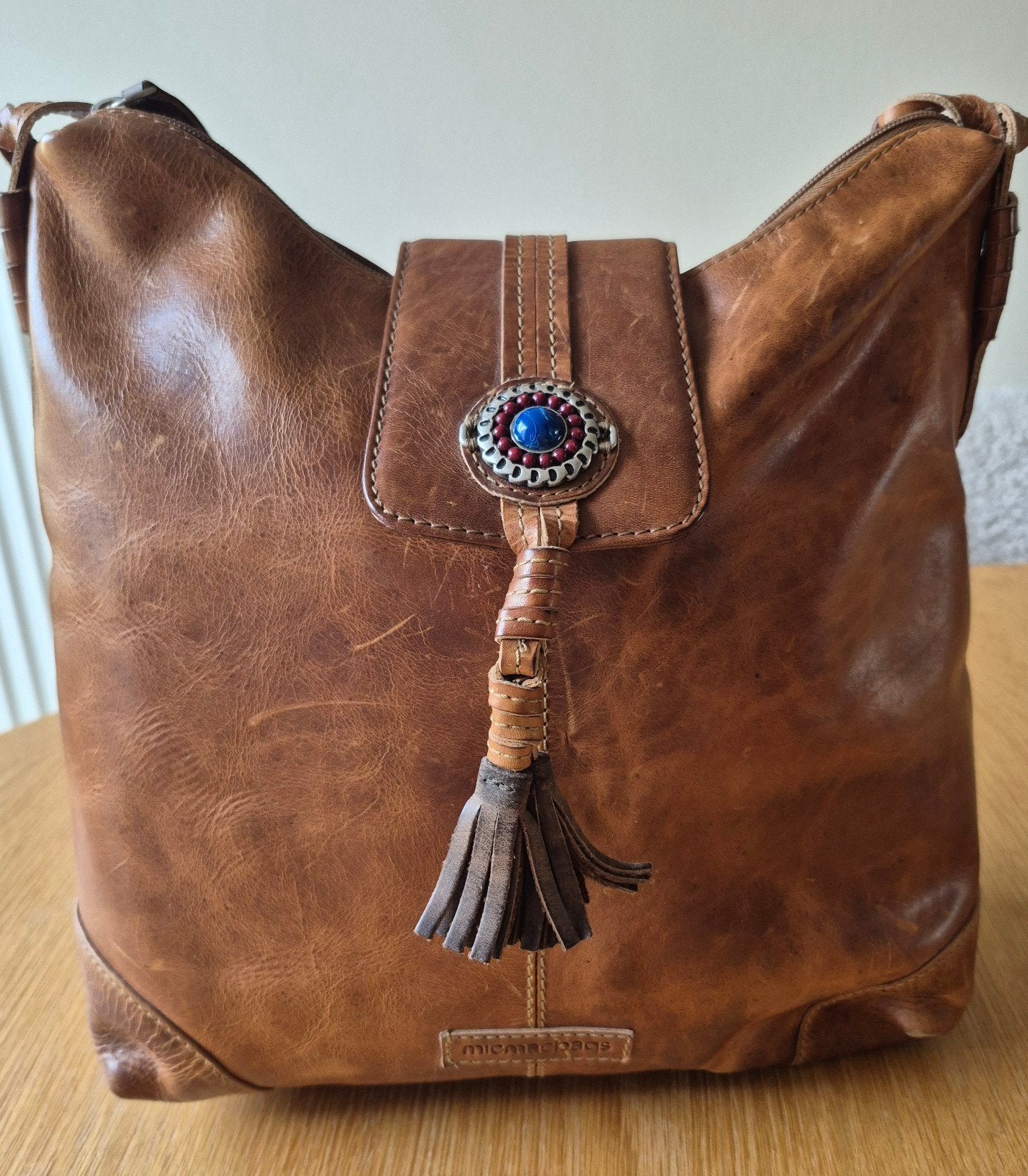 Micmacbags schoudertas, Ophalen
