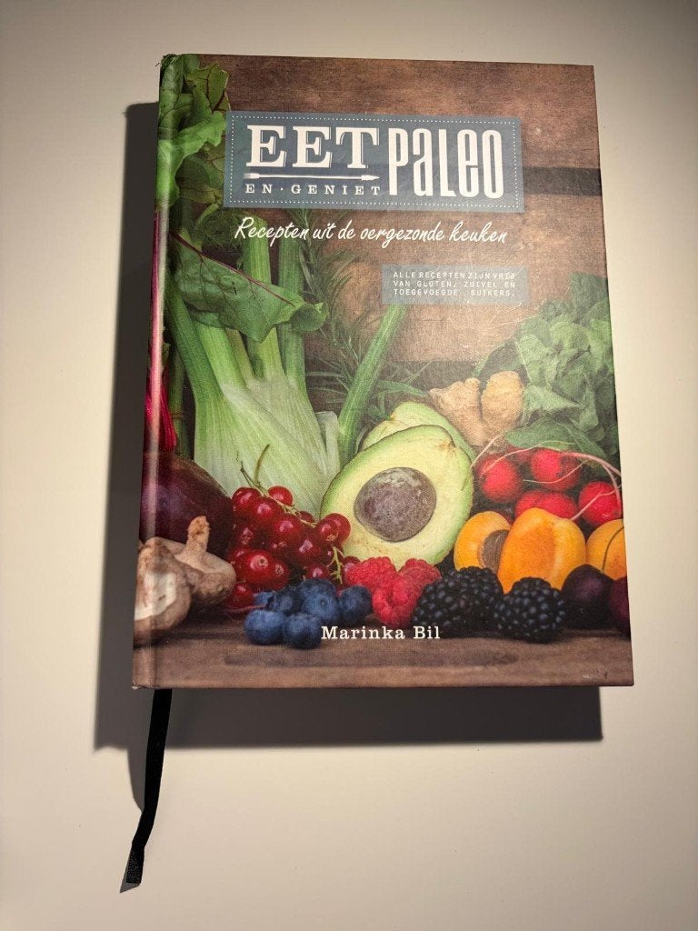 Eet Paleo en Geniet: Recepten uit de oergezonde keuken!, Marinka Bil, Dieet en Voeding, Ophalen of Verzenden, Zo goed als nieuw