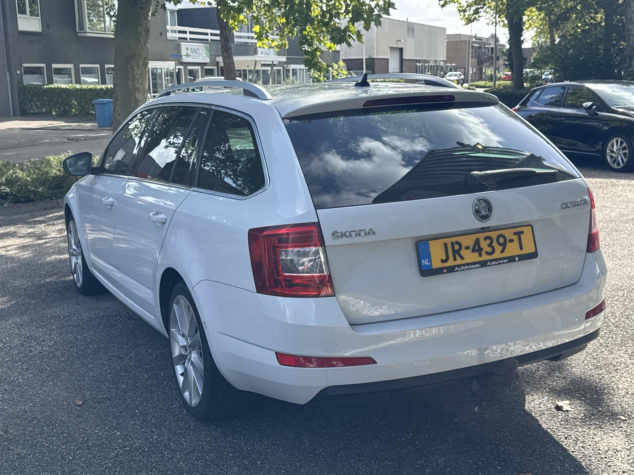 Skoda Octavia Combi 1.8 TSI Greentech Style Business, Auto's, Gebruikt, 4 cilinders, Wit, Origineel Nederlands