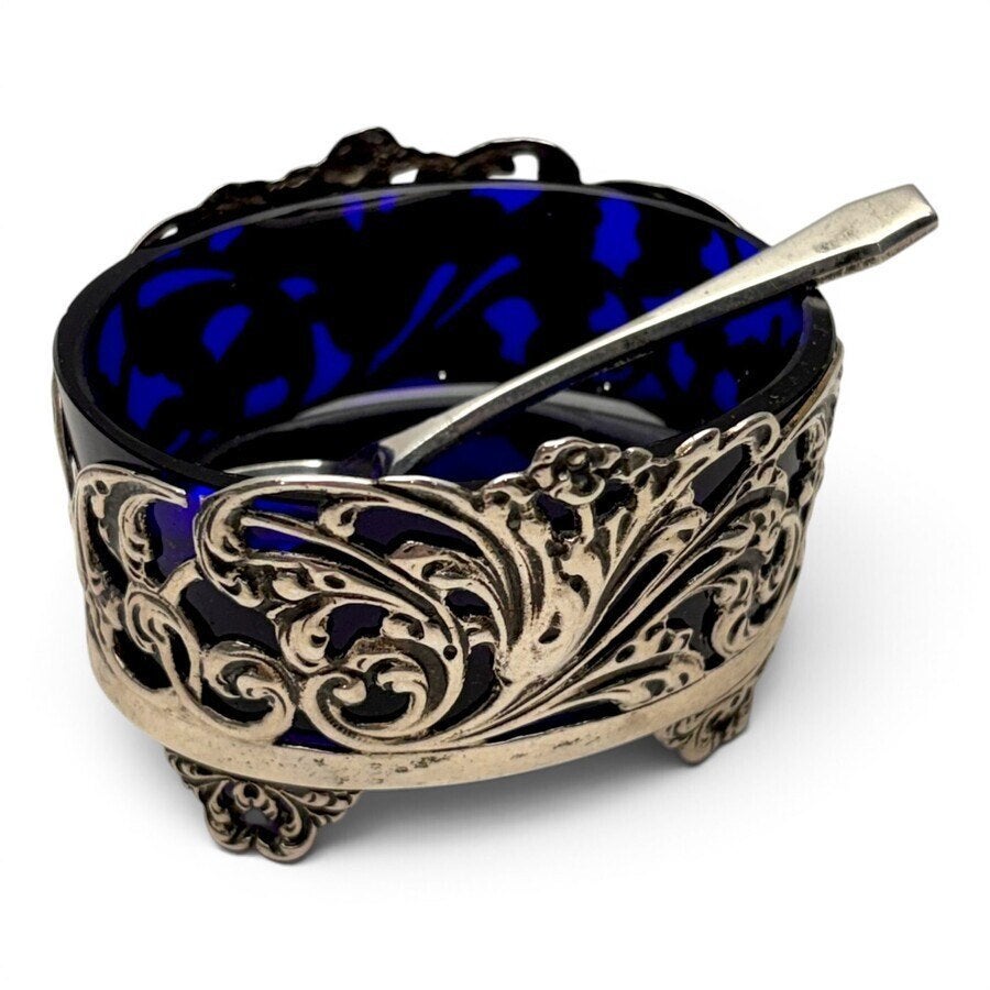 Zilveren zoutvaatje met blauw glazen montuur, Antiek en Kunst, Ophalen of Verzenden