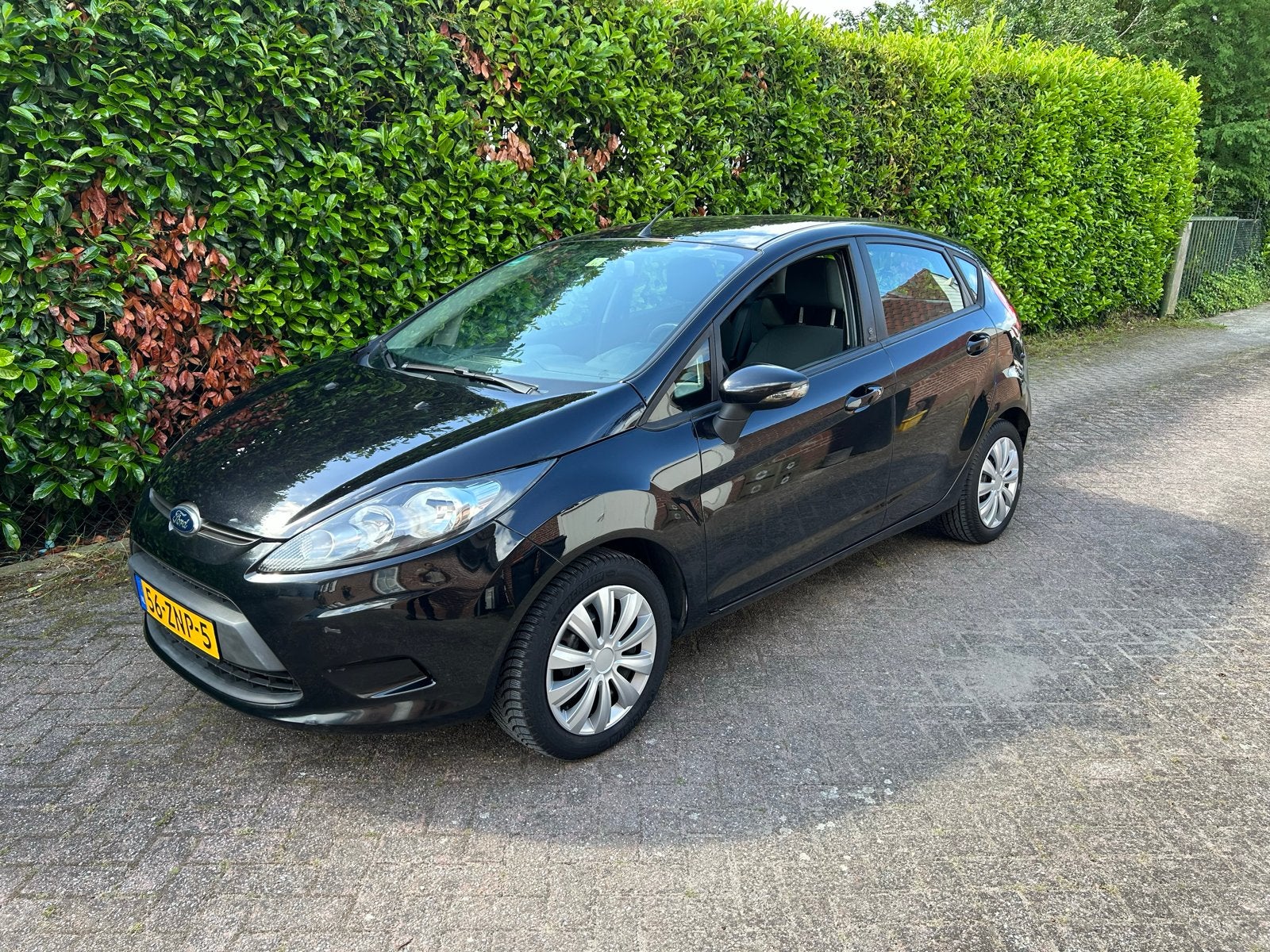Ford Fiësta 1.25 44KW 5DR 2012 Zwart 220790 km, Voorwielaandrijving, Stof, 40 €/maand, 4 cilinders