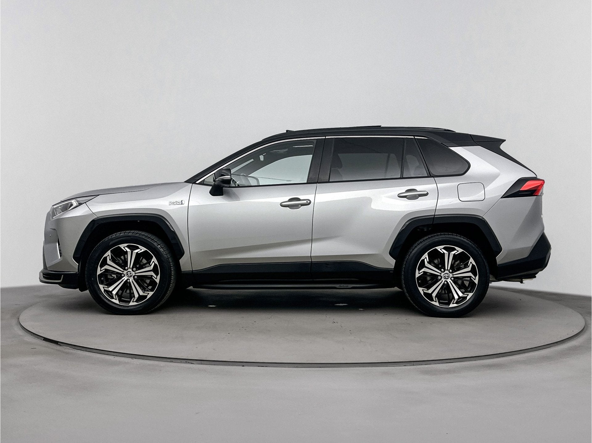 Toyota RAV4 2.5 Plug-in Hybrid AWD Bi-Tone Plus | Panoramada, Auto's, Automaat, 12 maanden, Gebruikt, 4 cilinders