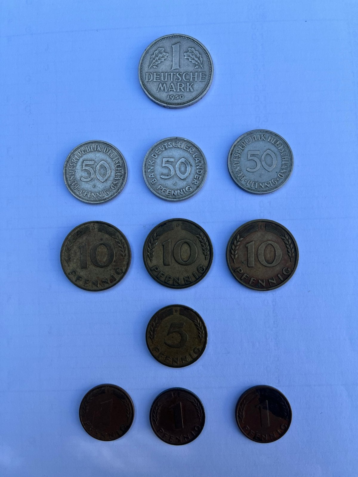 Duitse munten 1, 5, 10 en 50 pfenning en 1 Mark (1949-1950), Ophalen, Buitenland, Munten