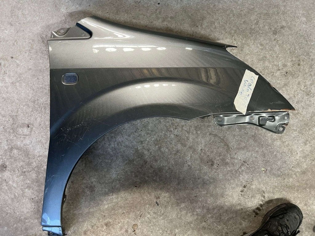 spatbord corolla verso scherm deukje rechts vanaf 2005 grijs, Auto-onderdelen, Carrosserie en Plaatwerk, Toyota, Toyota, Voor