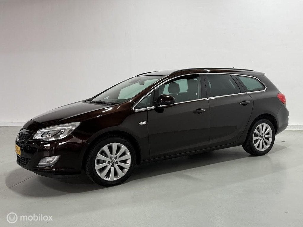 Opel Astra Sports Tourer 1.4 Turbo Sport, Voorwielaandrijving, Euro 5, Gebruikt, 4 cilinders