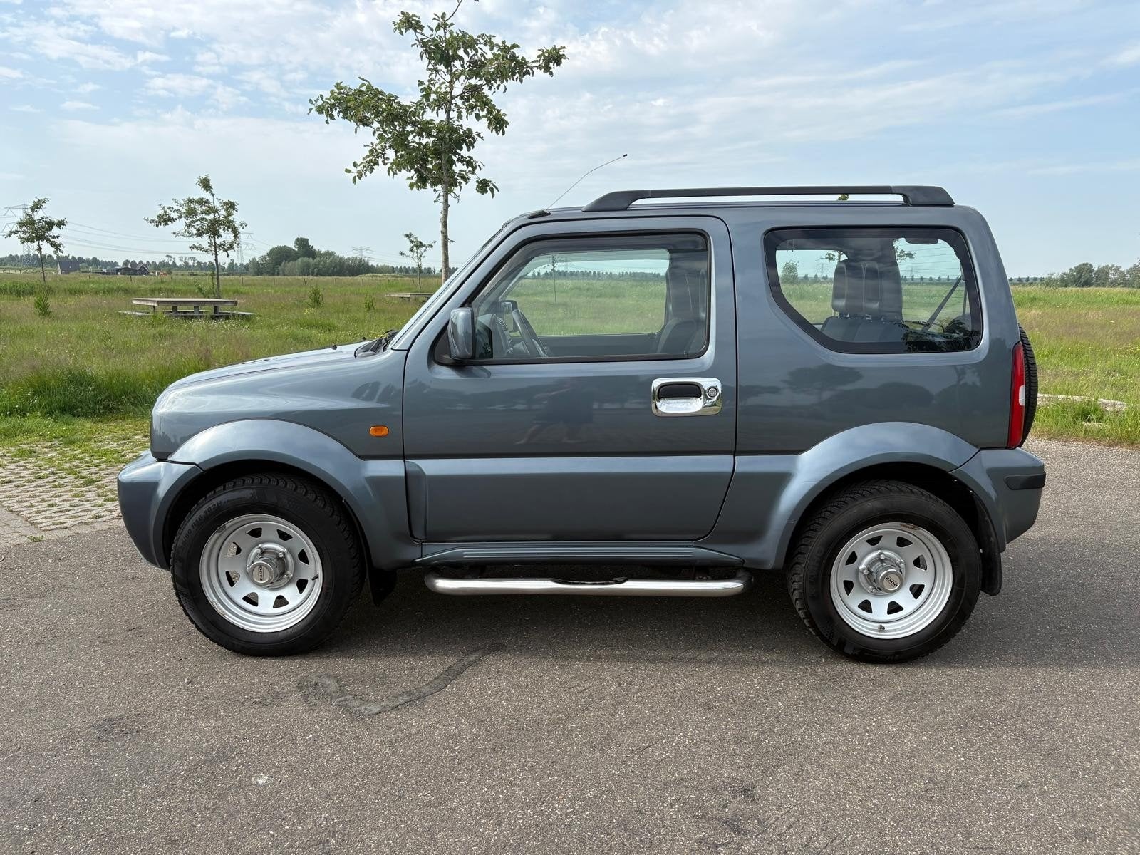 Suzuki Jimny 1.3 4WD 2005 Blauw Automaat, Automaat, 14 km/l, Vierwielaandrijving, Particulier