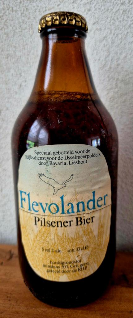 1986 oude fles FLEVOLANDER bier ijsselmeerpolders BAVARIA, Ophalen of Verzenden, Zo goed als nieuw, Flesje(s), Bavaria
